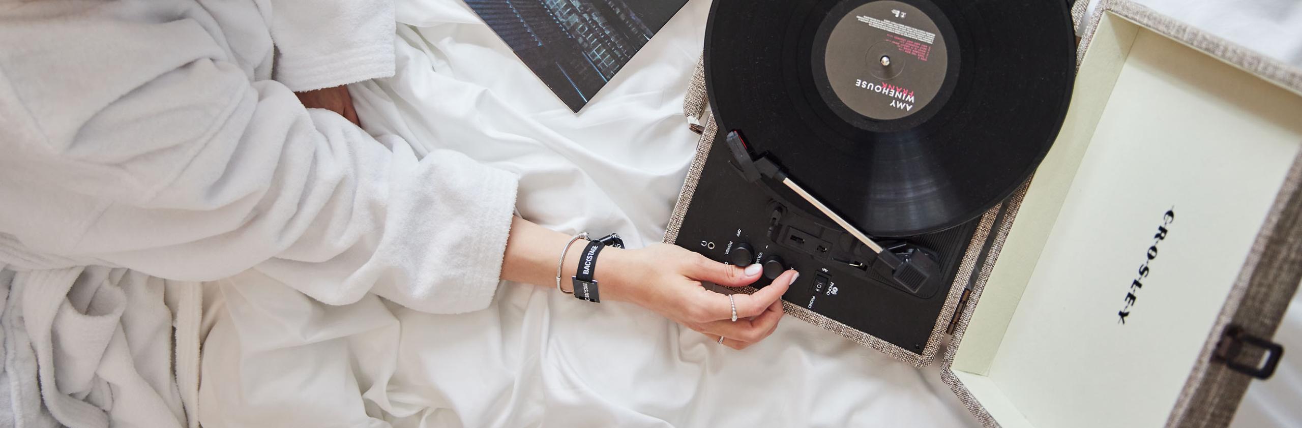 The Cumberland Hotel - Vinyl Playing on Bed