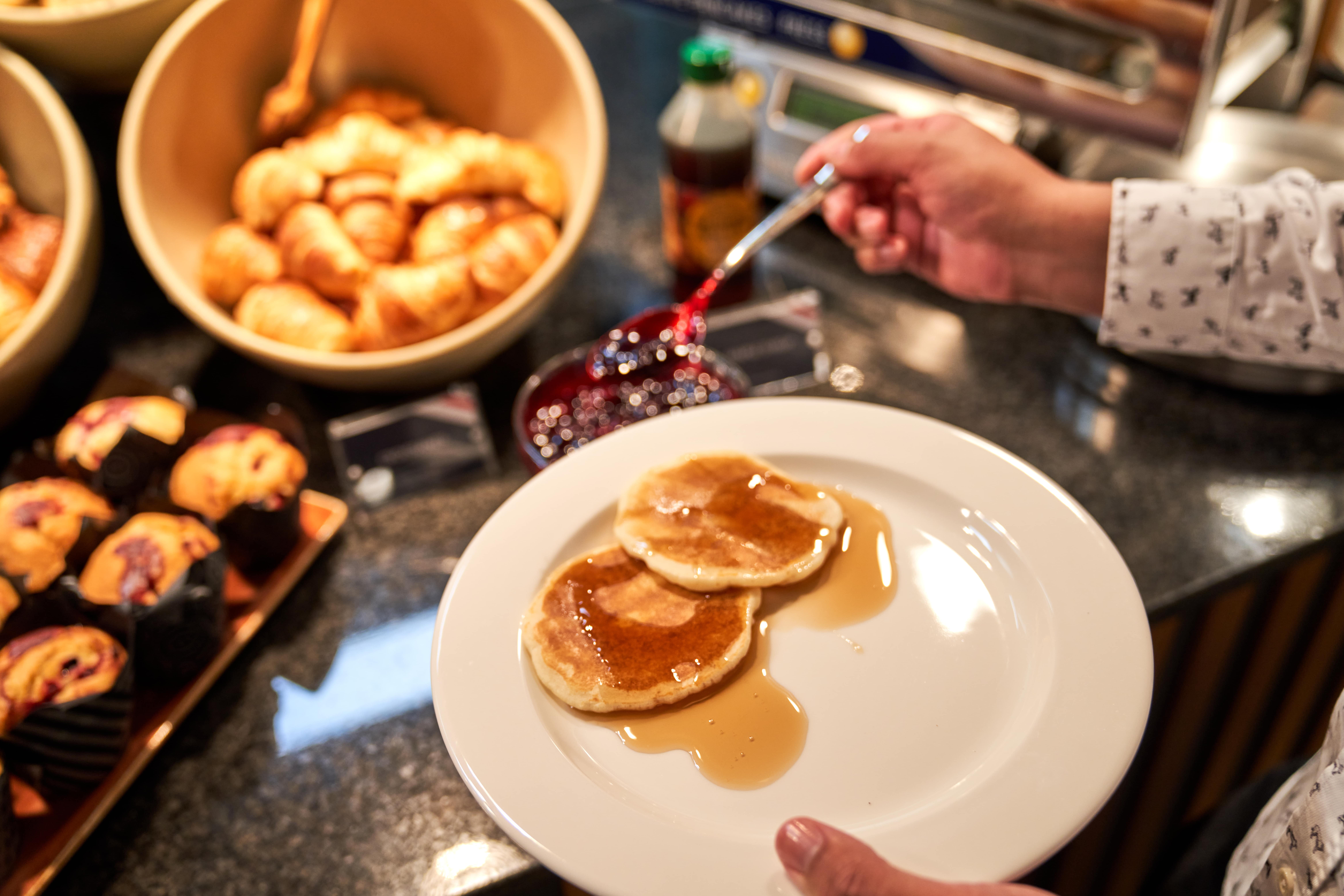 Pancakes on a plate in a buffet setting