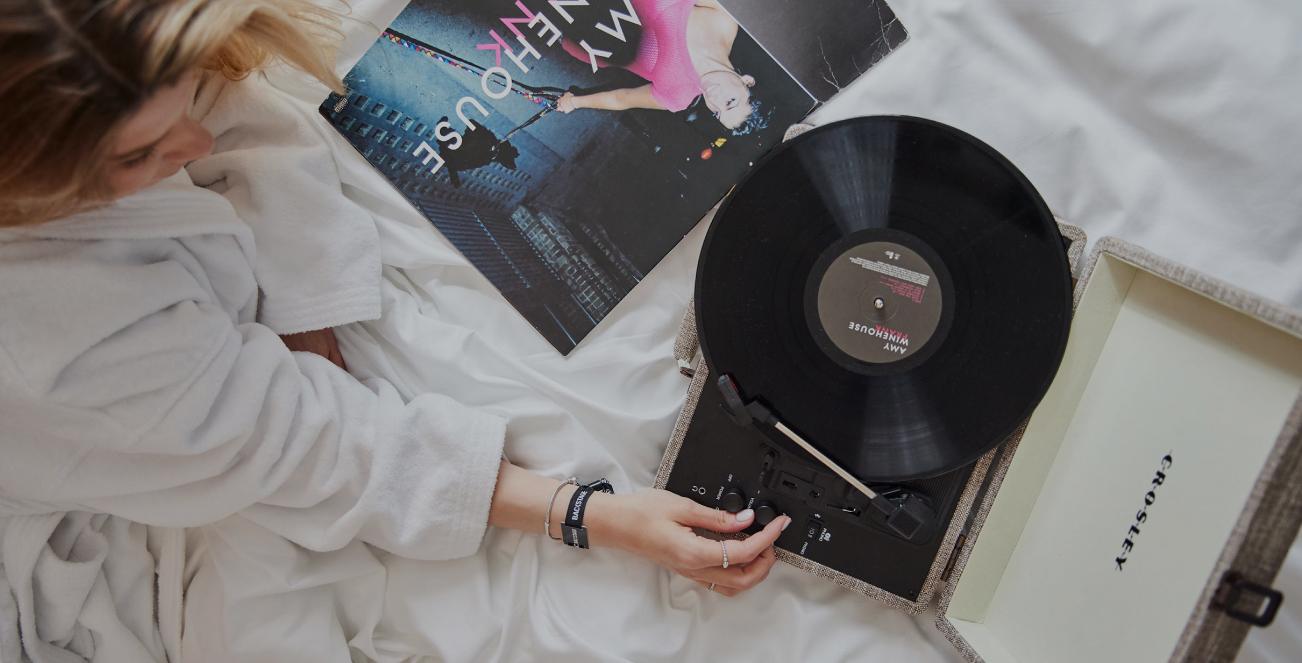 Women playing vinyl records