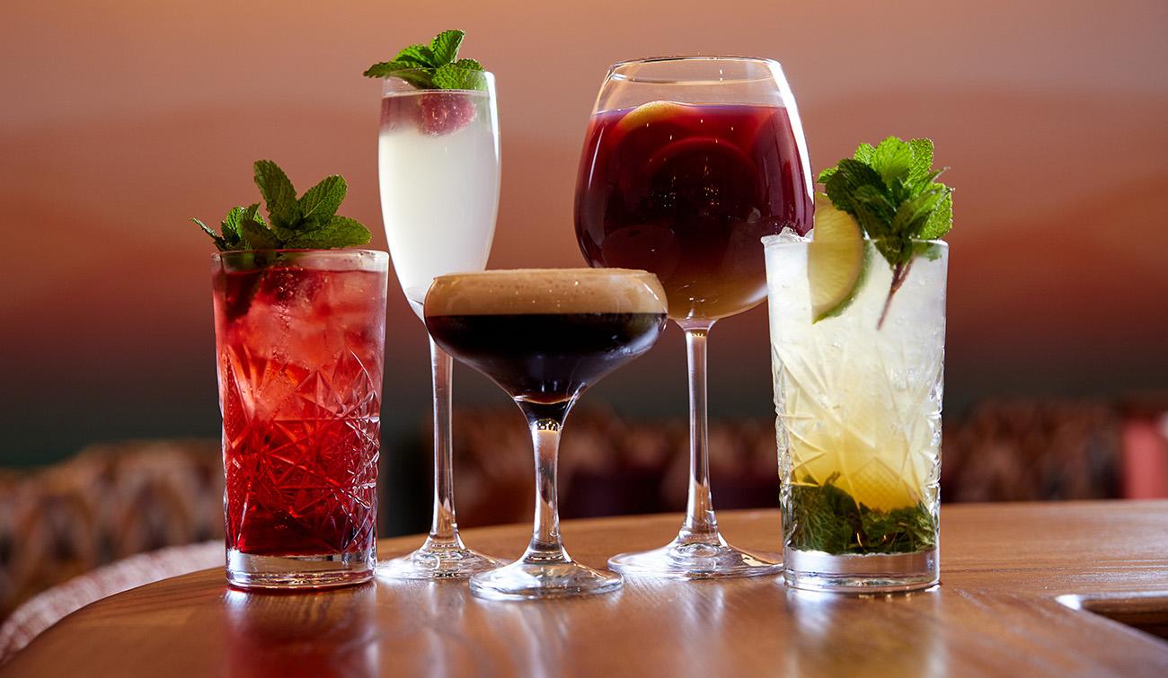 A group picture of five delicious cocktails