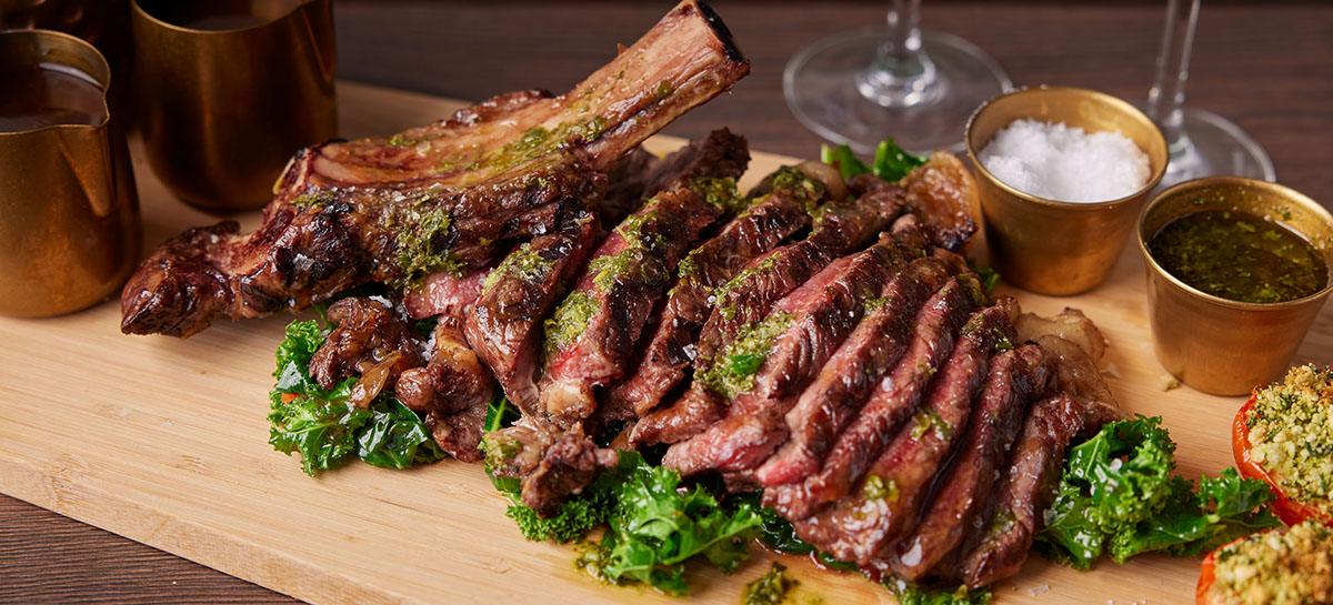 Delicious looking slices of steak presented on a board